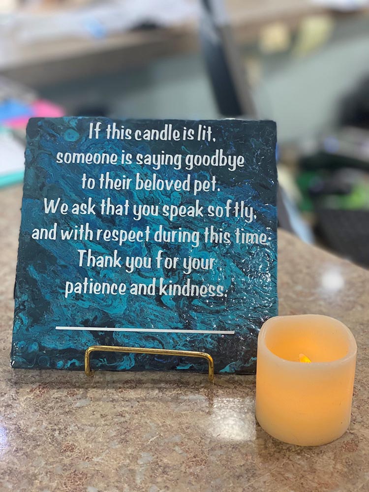 Pet memorial sign, candle